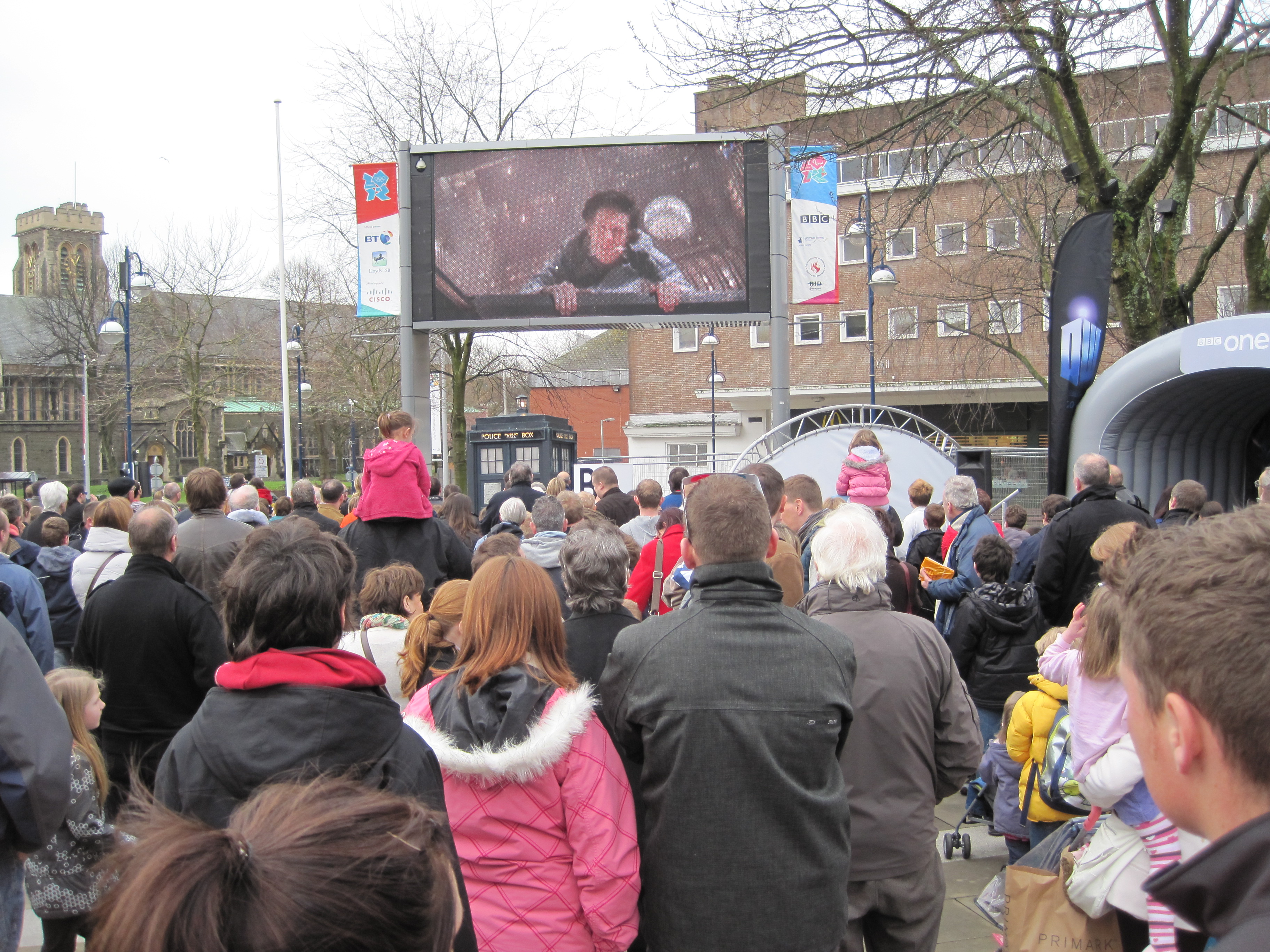 Crowd watching a Big Screen in a city centre