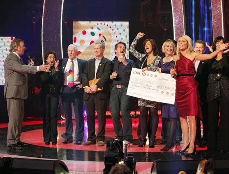 Sir Terry Wogan and varies celebrities on the Children in Need stage