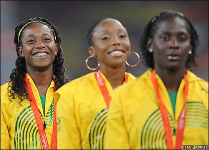 (L-R) gold medalist Shelly-Ann Fraser and joint silver medalists Kerron Stewart and Sherone Simpson 