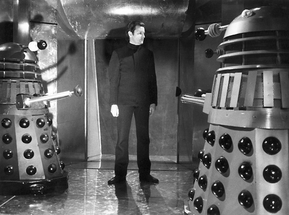 Picture shows Aubrey Woods as the Controller with Daleks