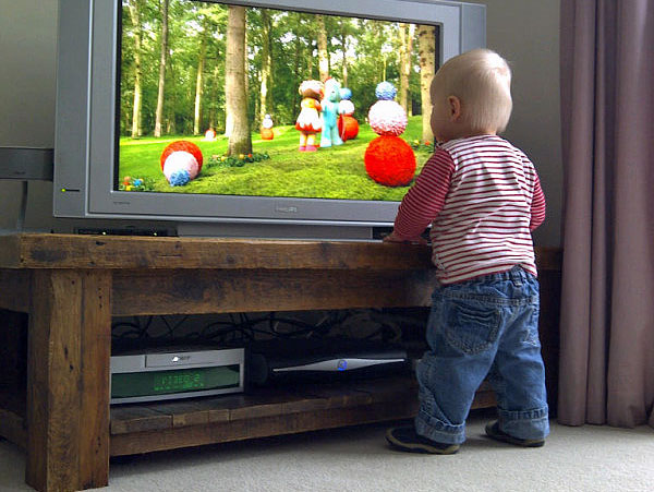 A young fan gets up and close to observe the finer detail of In the Night Garden. 