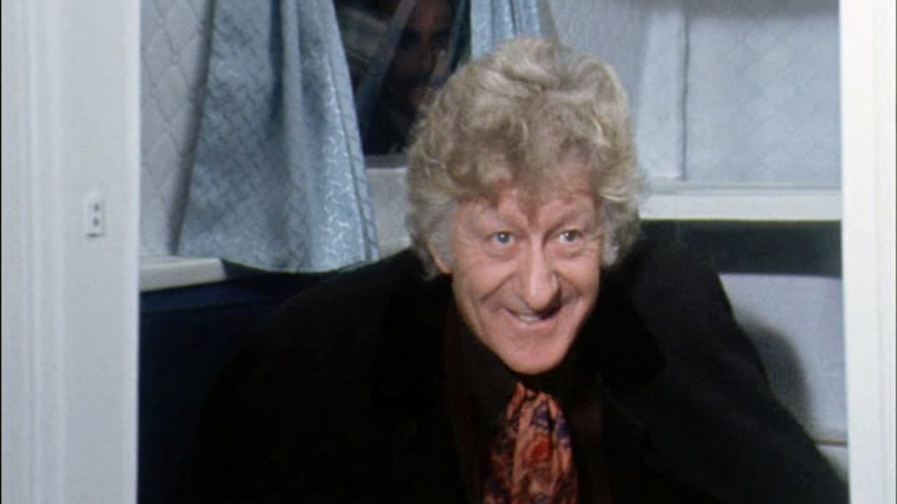 Jon Pertwee collapsing a caravan, 1972