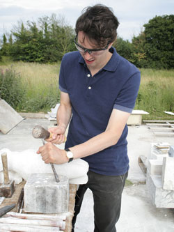 Alastair chisels the alabaster