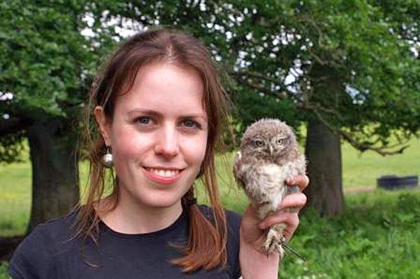 Emily Joáchim holds a little owl