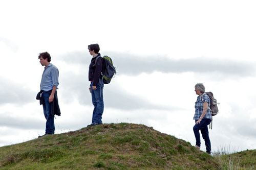 Stephen Mangan, Sue Perkins and Alison Steadman walking on a hill