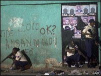 Police officers patrol the streets during a protest in Port-au-Prince, Haiti,