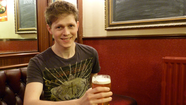 Scott Arthur plays Rhys, barman at The Bull
