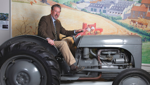 Timothy Bentinck (David Archer) sitting on a 'little grey Fergie' tractor