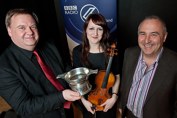The BBC Radio Scotland Young Traditional Musician of the Year 2011 Award winner Kristan Harvey with Jeff Zycinski and Andrew Dixon, Chief Executive of Creative Scotland.