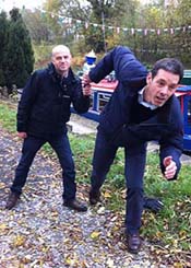 Mark Hutchings hands the torch over to Andrew Fletcher