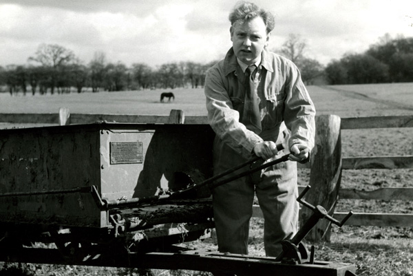 Norman Painting with Muck Spreader in 1954
