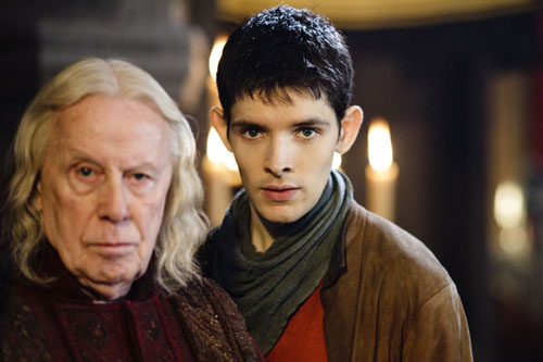 Merlin, played by Colin Morgan, with Gaius, played by Richard Wilson