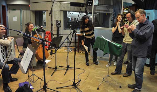 The cast and members of The Devil’s Violin Company in the studio