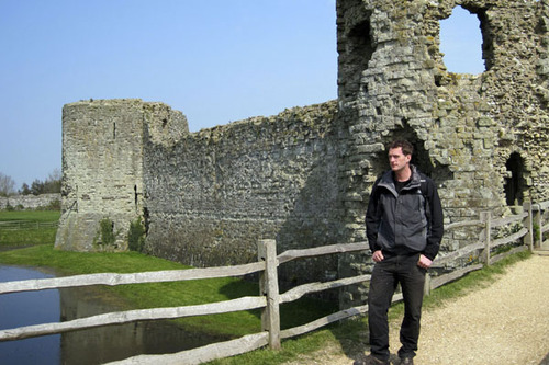 Dan Snow stands outside Pevensey Castle in Sussex