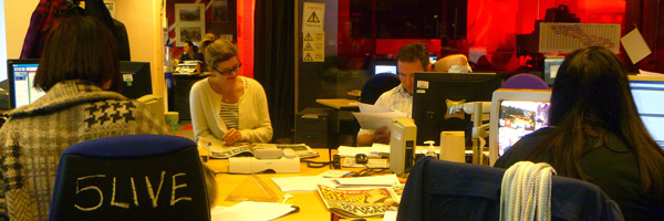The 5 live Breakfast day team prepare for the midday meeting