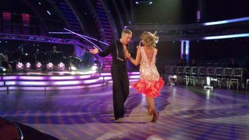 Rory Bremner and Erin Boag dancing in rehearsal.