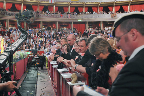 Audience members waiting for the music to start at the BBC Proms