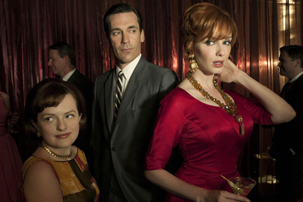 Peggy Olson, played by Elizabeth Moss, Don Draper, played by Jon Hamm, and Joan Harris, played by Christina Hendricks, in Mad Men
