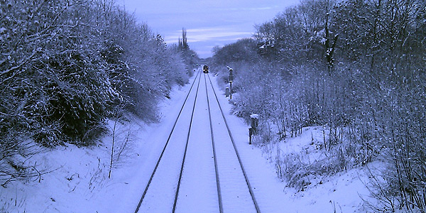 Train on snowy tracks