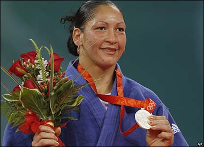 Silver medalist Yalennis Castillo of Cuba stand at the medals ceremony of the womens judo -78kg half heavyweight division finals, Aug. 14, 2008. (AP Photo/Charles Dharapak)
