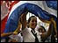 woman waves Cuban flag