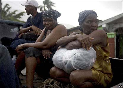 Residents of Gonaives, Haiti, in a truck