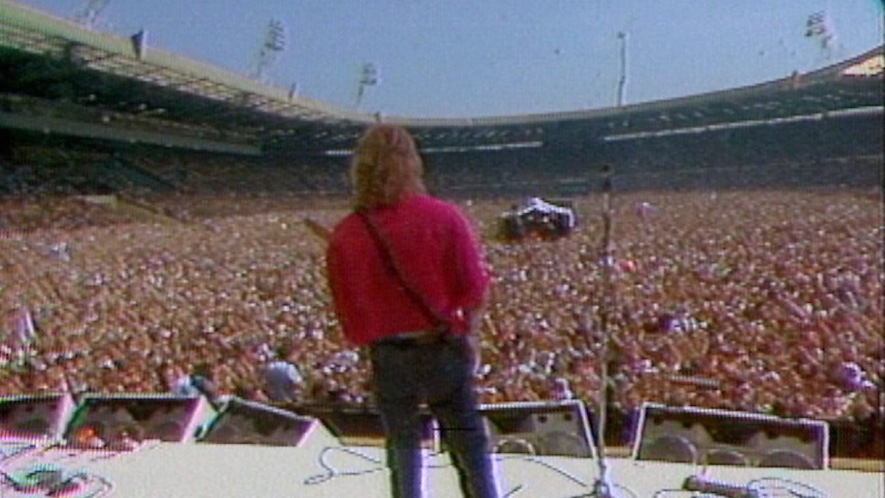 Live Aid raises millions, 1985