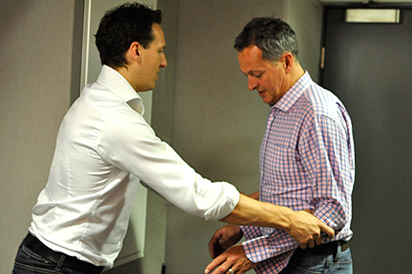 Brendan Cole giving Nick Nairn some dancing tips