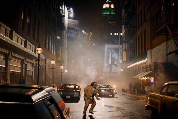 The same screenshot of Nick Frost crossing the street on set, but with special effects and CGI added