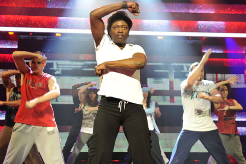 Andi Osho rehearsing her routine on stage for Let's Dance For Comic Relief