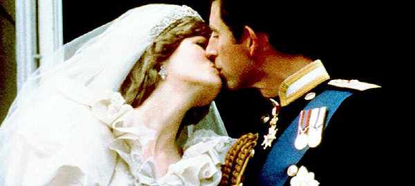 Prince Charles and Diana the Princess of Wales kiss on the balcony of Buckingham Palace after their wedding