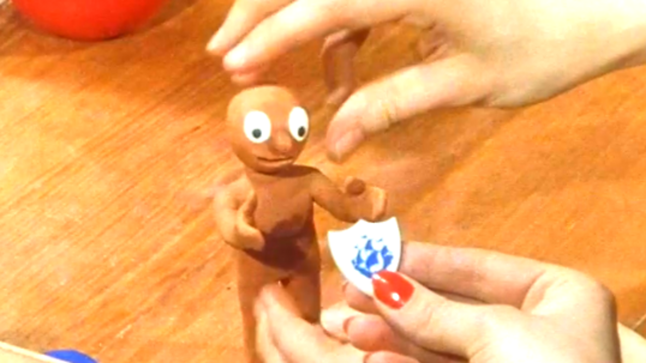 Morph gets a Blue Peter badge, 1981