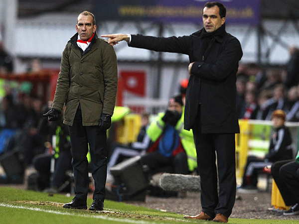 Swindon Town manager Paolo Di Canio and Wigan Athletic manager Roberto Martinez
