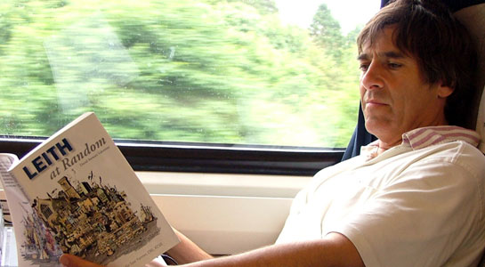 Mark Steel reading about Leith on a train