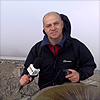 A photo of 5 live reporter Mark Hutchings on a misty peak