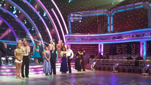 The Strictly couples standing in the ballroom.