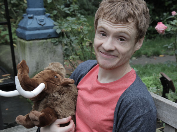 Andrew Lawrence and woolly mammoth on a park bench