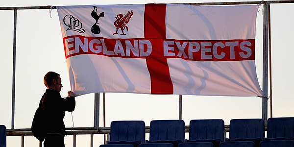 An England fan puts up a flag ahead of the EURO 2012 Qualifier match between Bulgaria and England at the Vasil Levski National Stadium on September 2, 2011 in Sofia, Bulgaria.