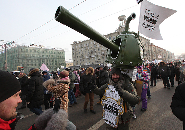 Russian protestor dressed as a tank