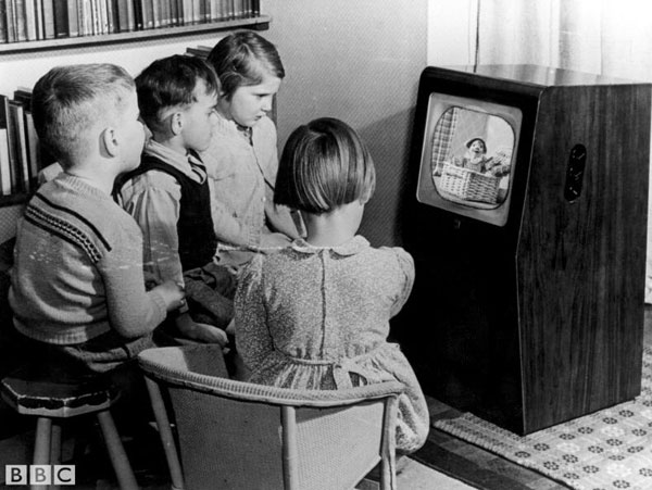 Children watching television. 