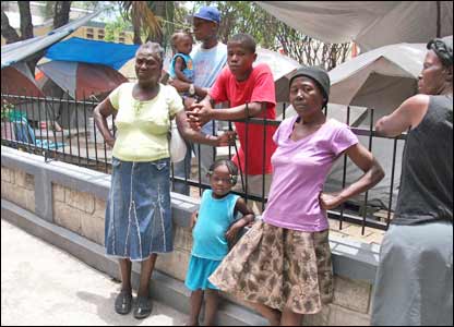 family lean against railings (photo by Gemma Handy)