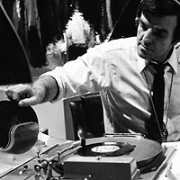 A DJ chooses a record