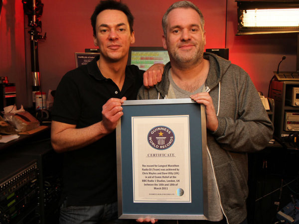 Chris Moyles and 'Comedy Dave' Vitty collect their Guinness world record for world's longest radio show.