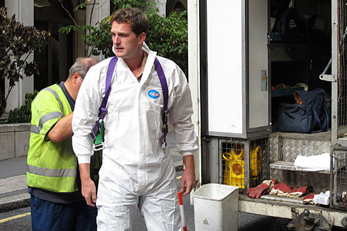 Dan Snow prepares to go into a sewer.