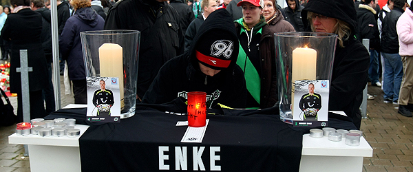  A boy writes in the book of condolence in front of the AWD Arena on November 11, 2009 in Hanover, Germany. Enke, 32, goalkeeper for Hannover 96 and the German national team, was struck and killed the day before by a train at Neustadt am Rubenberge. Police confirmed that it was suicide.