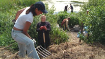 volunteers working by the lake