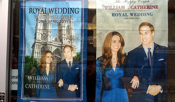 Two royal wedding tea towels in a shop window