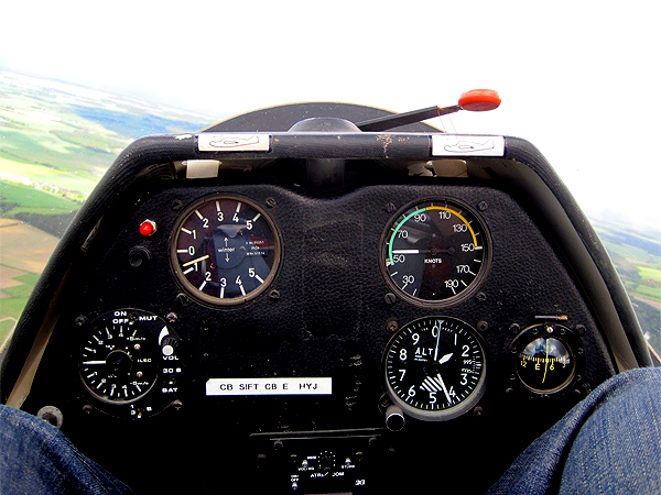 Mark's knees and some cockpit instruments