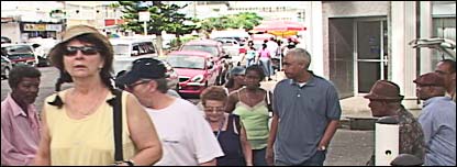 street scene featuring tourists and residents in Caribbean