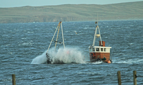 boat in rough sea